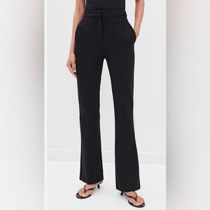 Favorite Daughter black slacks with silk line on side